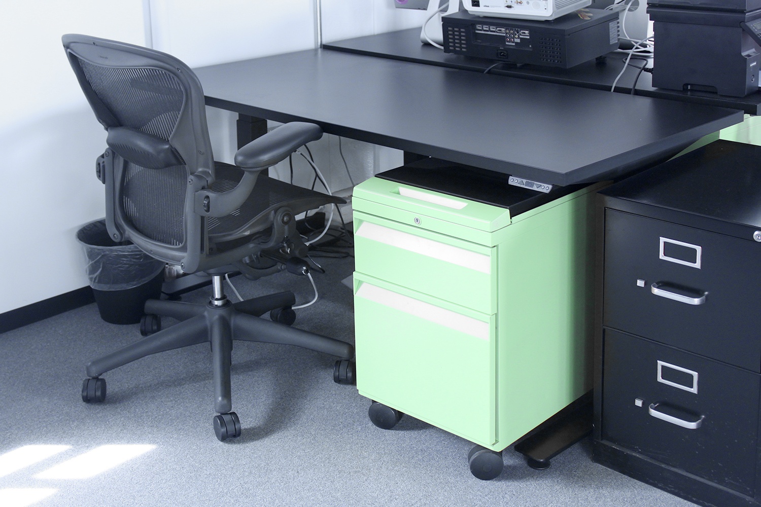Sit-stand desks with Herman Miller Aeron task chairs.